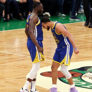 6'3" Stephen Curry shockingly nails water cup out Draymond Green's hand with behind the back shot