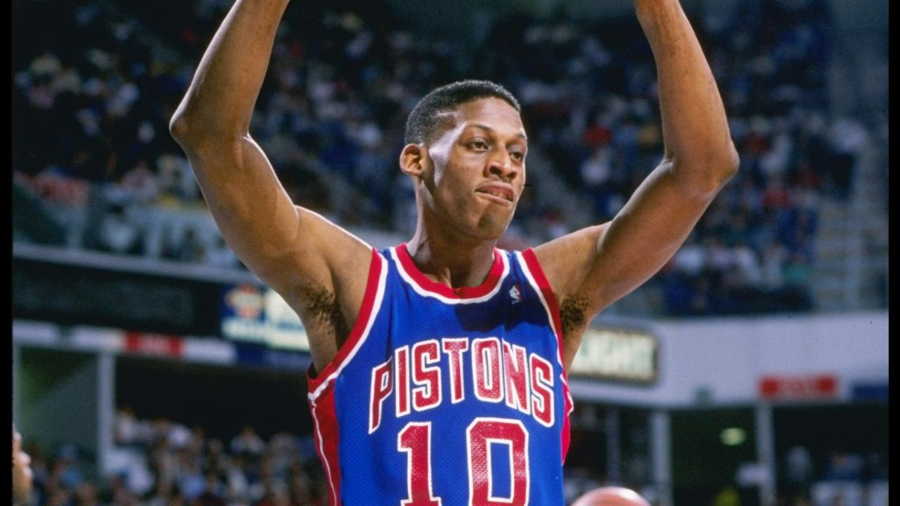 A frustrated 29 y/o Dennis Rodman kicked the ball off a cameraman’s hand, onto the face of a fan