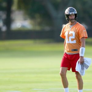 NFL fans theorize Tom Brady left the Buccaneers to earn $200,000 on a famous singing competition which featured T-Pain and Donald Trump's attorney