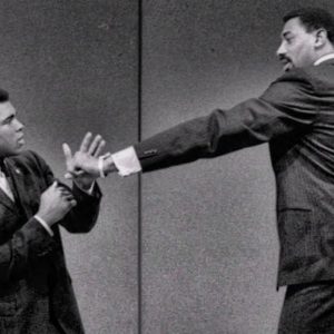 7'1" Wilt Chamberlain and 236 pound Muhammad Ali sized each other up in "rare GOAT footage"