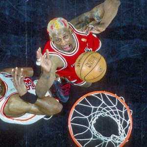 Dennis Rodman, who's dated Madonna and Carmen Electra, kissed drag queen RuPaul on live television