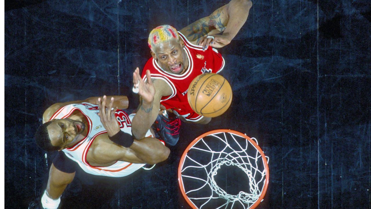 Dennis Rodman, who's dated Madonna and Carmen Electra, kissed drag queen RuPaul on live television