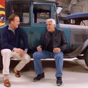 Peyton Manning and Jay Leno flexed their $700 million fortune with a joyride on the $165,000 car that kicked off the NFL