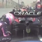 41-year-old Fernando Alonso and future Aston Martin teammate Lance Stroll inspect Max Verstappen's RB18 rear-wing