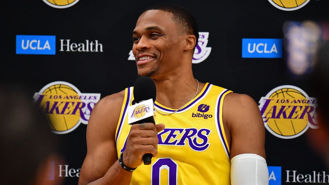 WATCH: Russell Westbrook Makes a Grown Man Go Back From “You Suck A*#” to "C'mon Baby, We Need You" in No Time