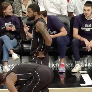 NBA Twitter Reacts to Kyrie Irving Being Welcomed by Fans at Courtside Wearing "Fight Antisemitism" T-Shirts