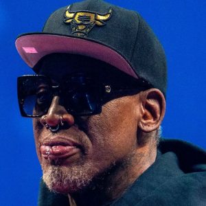 Getting paid $5 million from Spurs didn’t stop Dennis Rodman from bleaching his hair and missing their stadium's opening