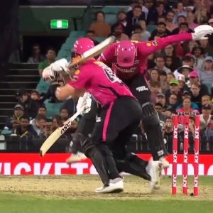 "Right in the nasty area": Steve Smith flat-bat shot hits Moises Henriques in the abdomen during Sydney derby
