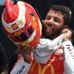 Jun 24, 2023; Nashville, Tennessee, USA; NASCAR Cup Series driver Bubba Wallace (23) after his first qualifying run at Nashville Superspeedway. Mandatory Credit: Christopher Hanewinckel-USA TODAY Sports