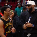 Flexing $100,000+ Worth Of Items, Bronny James Shares LeBron James Throwback Ahead Of USC Debut