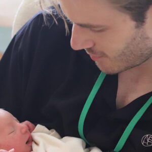 PewDiePie holding newborn son Bjorn