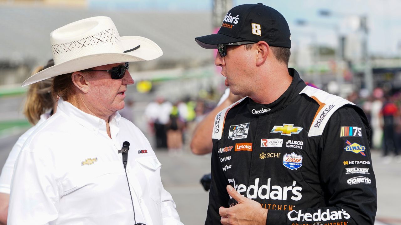 NASCAR Cup Series car owner Richard Childress talks with NASCAR Cup Series driver Kyle Busch (8) during qualifying on pit row at Atlanta Motor Speedway.
