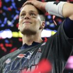 New England Patriots quarterback Tom Brady (12) celebrates with the Vince Lombardi Trophy after beating the Atlanta Falcons during Super Bowl LI at NRG Stadium.