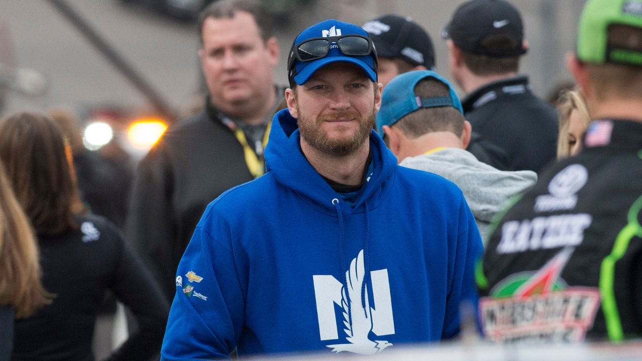 Sprint Cup Series driver Dale Earnhardt Jr. (88) waits out a rain delayed start of the Duck Commander 500 at Texas Motor Speedway.