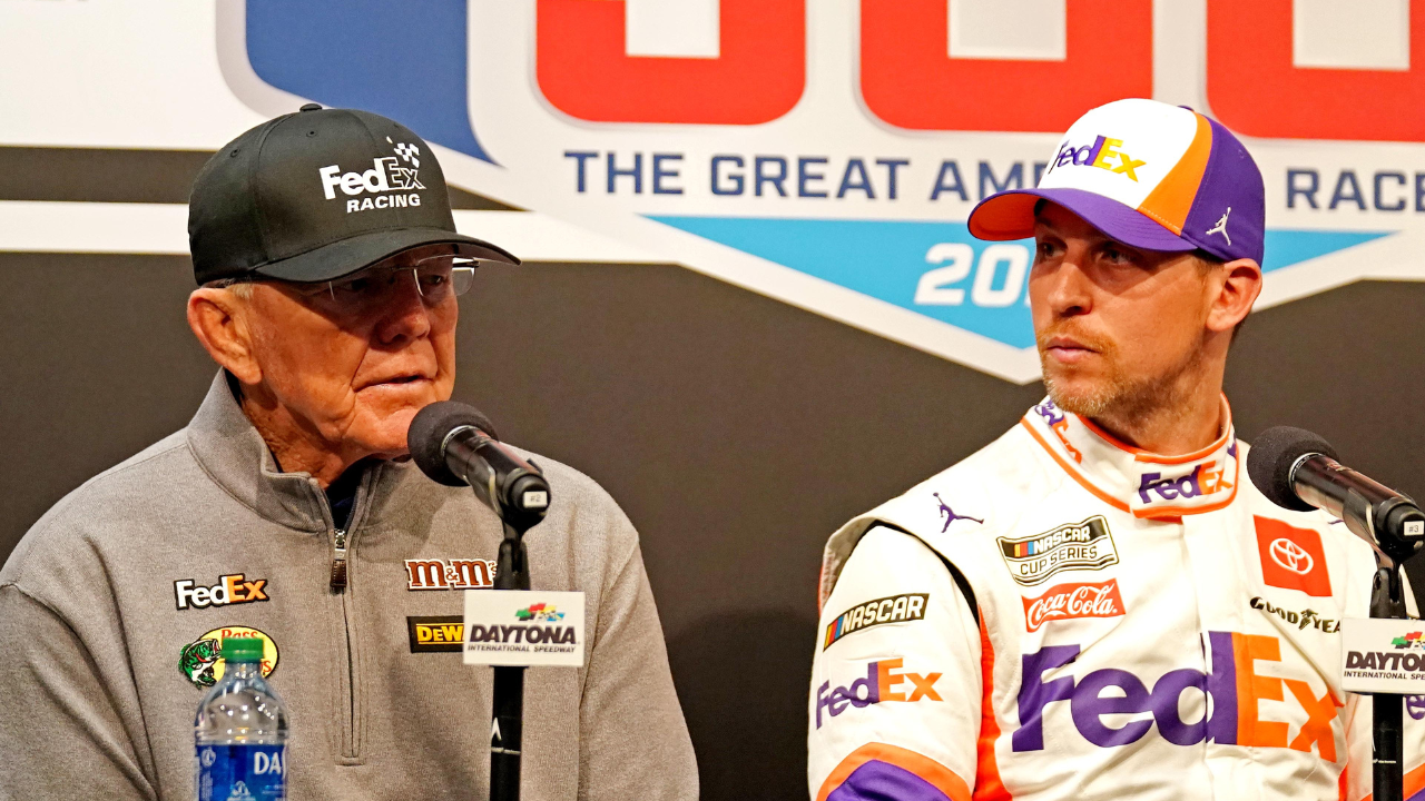 Feb 17, 2020; Daytona Beach, Florida, USA; NASCAR Cup Series driver Denny Hamlin (11) speaks to media with team owner Joe Gibbs (left) after the Daytona 500 at Daytona International Speedway. Mandatory Credit: John David Mercer-USA TODAY Sports