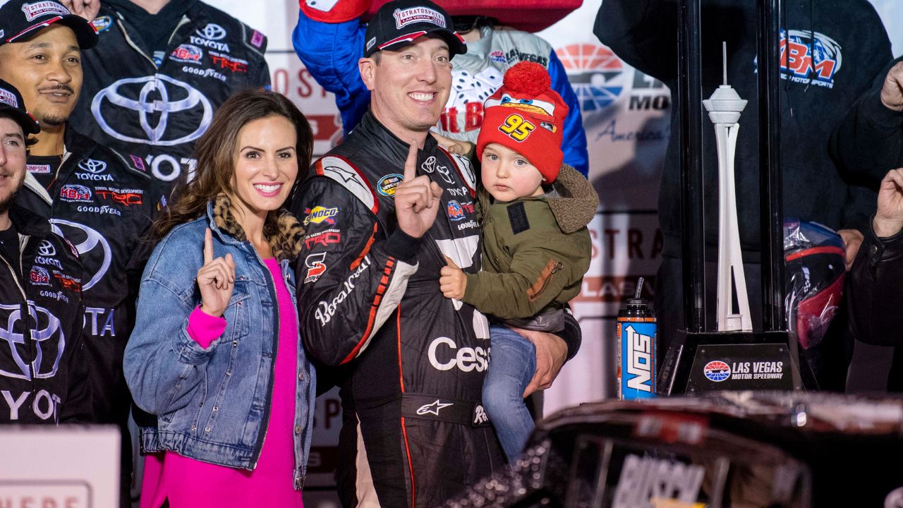 Mar 2, 2018; Las Vegas, NV, USA; Camping World Truck Series driver Kyle Busch (51) and son Brexton Busch and wife Samantha Busch celebrate Kyle winning the Stratosphere 200 at Las Vegas Motor Speedway. Mandatory Credit: Jerome Miron-USA TODAY Sports