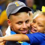 Jun 12, 2017; Oakland, CA, USA; Golden State Warriors guard Stephen Curry (30) celebrates with his daughter Riley Curry after beating the Cleveland Cavaliers in game five of the 2017 NBA Finals at Oracle Arena.