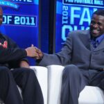 WATCH: Michael Irvin Flexes Deion Sanders’ Custom Gold Razr Prime Phone