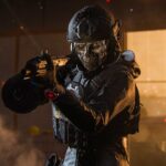 An image of a person holding a gun