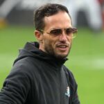 Mike McDaniel Pulls Up to Week 1 in His Bentley, Flaunting His $4,200 Backpack