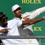 Usain Bolt Waves the Lewis Hamilton Flag While Daring Mercedes for Next Season