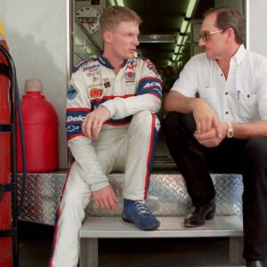 May 21, 1998 - Concord, NC, USA - Dale Earnhardt Jr. and Dale Earnhardt Sr., sit on the back of a transporter discussing Earnhardt Jr. s preparation for Carquest 300 Grand National qualifications on May 21, 1998 in Concord, N.C. Dale Earnhardt Jr. to retire