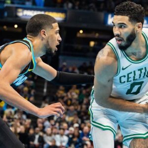 Dec 4, 2023; Indianapolis, Indiana, USA; Boston Celtics forward Jayson Tatum (0) holds the ball while Indiana Pacers guard Tyrese Haliburton (0) defends in the first half at Gainbridge Fieldhouse. Mandatory Credit: Trevor Ruszkowski-USA TODAY Sports