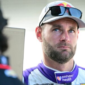 Shane van Gisbergen stands in his pits before practice and qualifying at the Indianapolis Motor Speedway Road Course.
