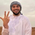 Adin Ross stood against racist jokes and boots out people off stage during Christmas stream