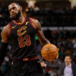 Cleveland Cavaliers forward LeBron James (23) looks on from the court against the Boston Celtics in the first quarter at TD Garden.