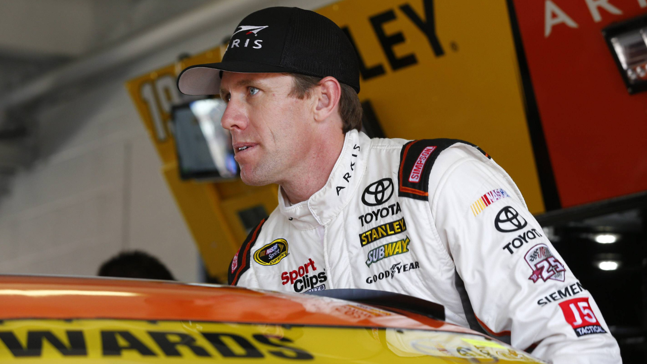 Carl Edwards (19) hangs out in the garage during practice for the Ford EcoBoost 400 at the Homestead-Miami Speedway in Homestead, FL.