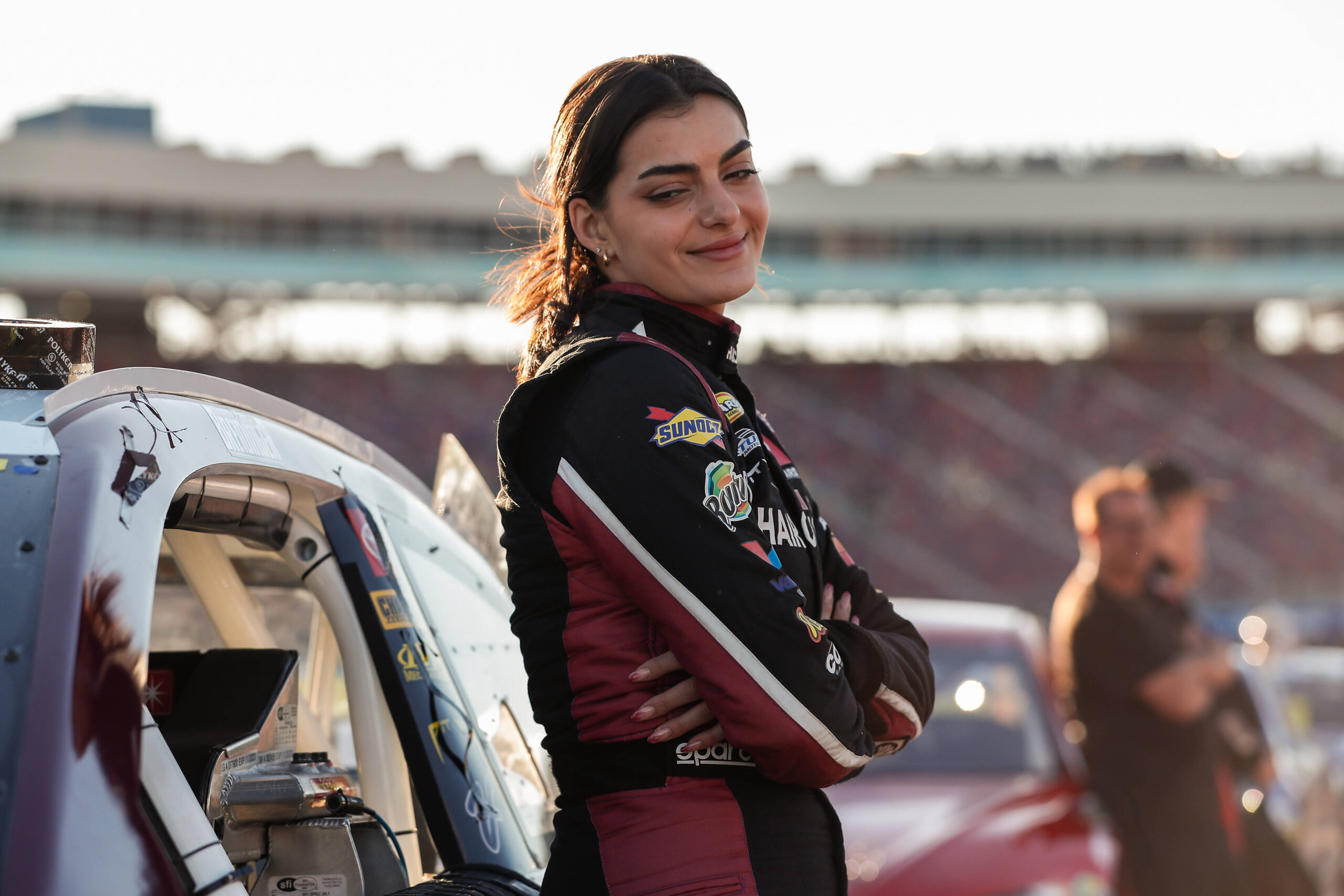 Toni Breidinger, driver of the 25 Hair Club Toyota, looks on before the ARCA Menards Series General Tire 150 on March 11, 2022 at Phoenix Raceway in Avondale, Arizona.