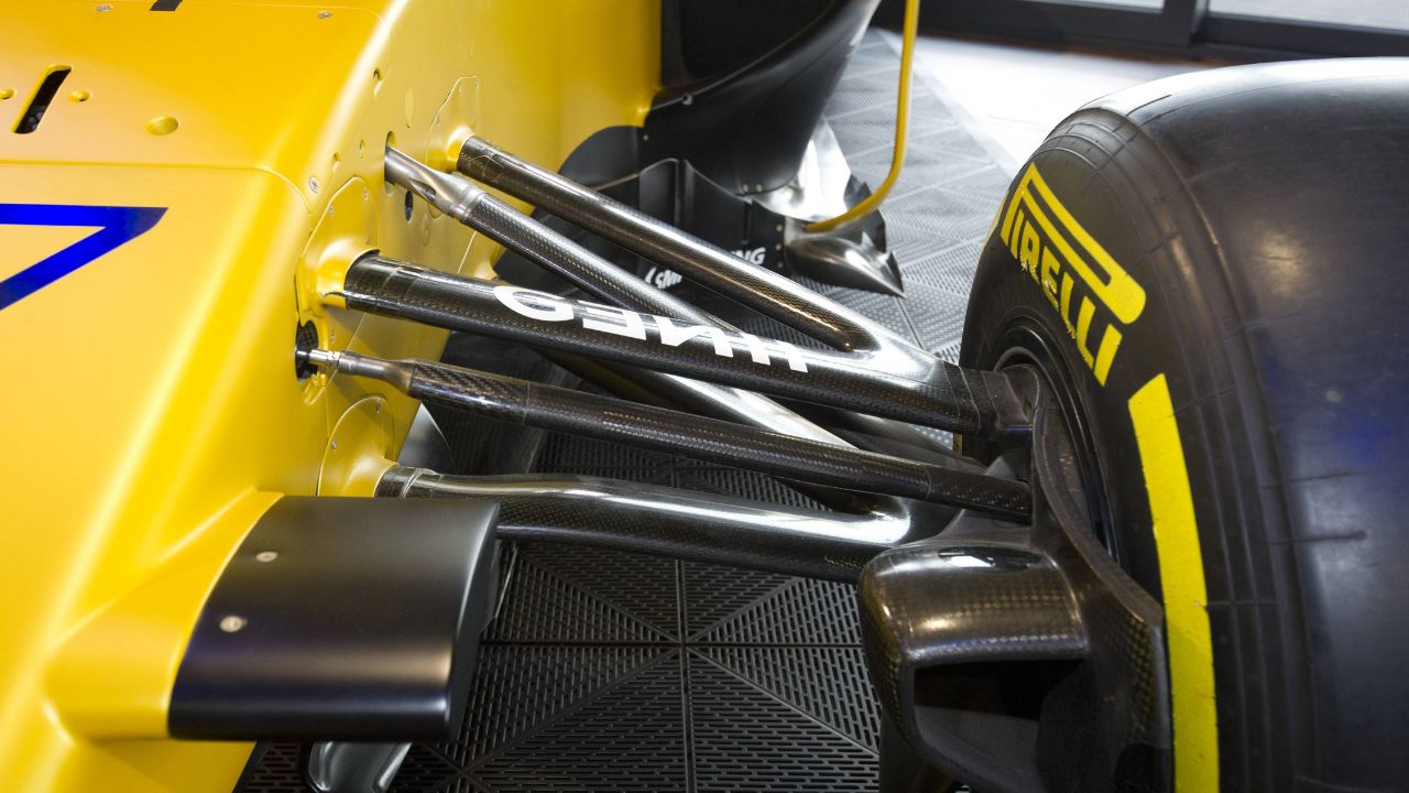 What Is the Difference Between a Push Rod and a Pull Rod Suspension in an F1 Car?
