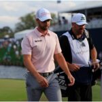 Wyndham Clark and caddie