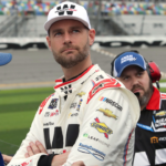 Shane van Gisbergen watches the action on the giant TV screen as he and the crew wait for their qualifying run, Saturday February 17, 2024 for the United Rentals 300 at Daytona International Speedway.
