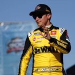 DAYTONA, FL - FEBRUARY 19: Christopher Bell 20 Joe Gibbs Racing DEWALT- Interstate Batteries Toyota waves to the crowd prior to the running of the NASCAR, Motorsport, USA Cup Series Daytona 500 on February 19, 2024 at Daytona International Speedway in Daytona Beach, FL. Photo by Jeff Robinson/Icon Sportswire AUTO: FEB 19 NASCAR Cup Series DAYTONA 500 EDITORIAL USE ONLY Icon240219611500