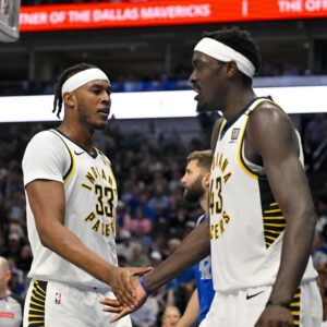 Mar 5, 2024; Dallas, Texas, USA; Indiana Pacers center Myles Turner (33) celebrates with forward Pascal Siakam (43) during the second half against the Dallas Mavericks at the American Airlines Center. Mandatory Credit: Jerome Miron-USA TODAY Sports