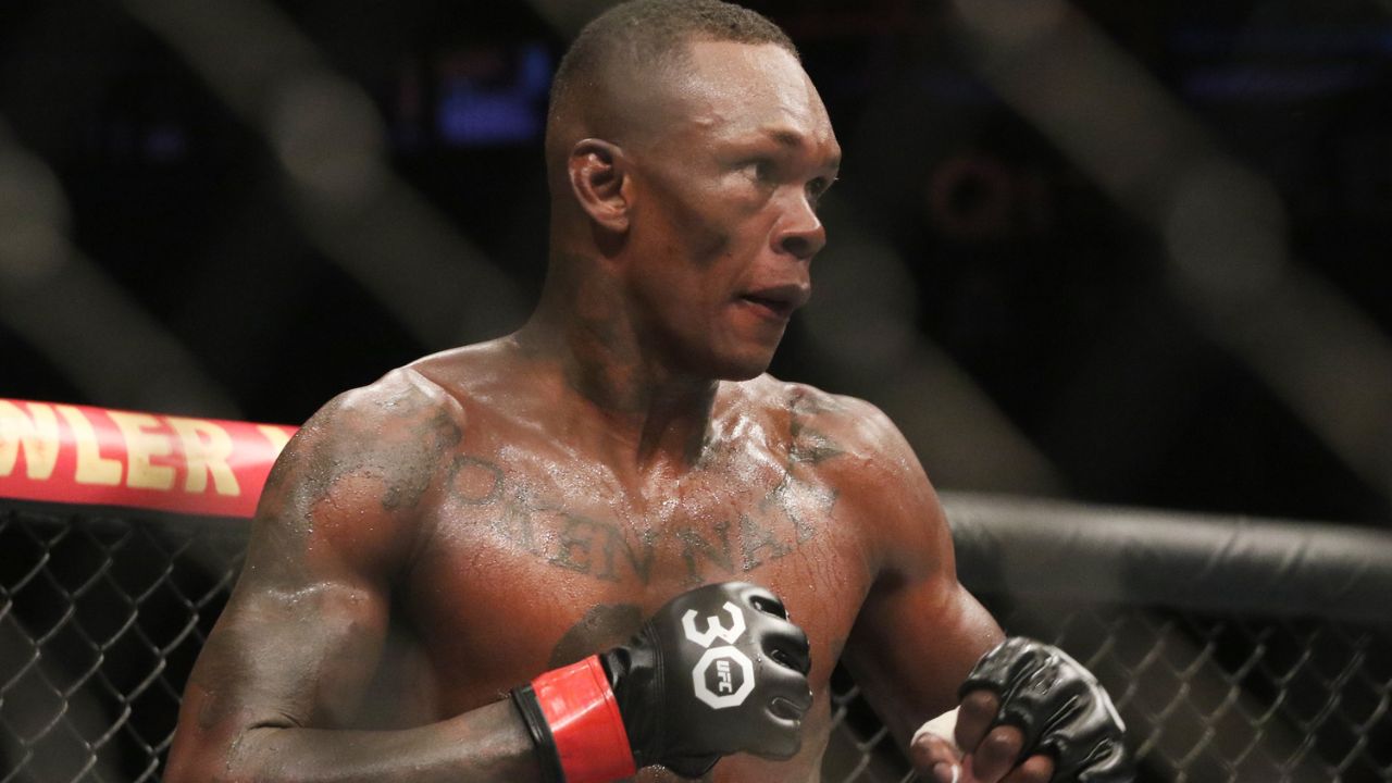 Israel Adesanya Cites Michael Jordan and Khabib Nurmagomedov to Explain Joe Rogan ‘Value of Fatherly Support’