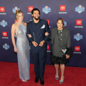 Caleb Williams with his girlfriend and mother.