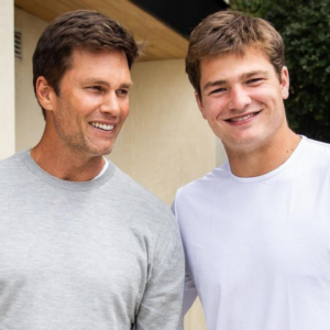 Drake Maye posing with Tom Brady,
