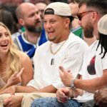 Man Sitting Behind Patrick Mahomes & Travis Kelce Steals The Show During Chiefs' Mavs Visit