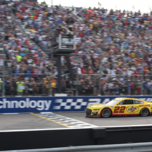 NASCAR Cup Series driver Joey Logano (22) crosses the finish line to win the Enjoy Illinois 300 at World Wide Technology Raceway at Gateway.
