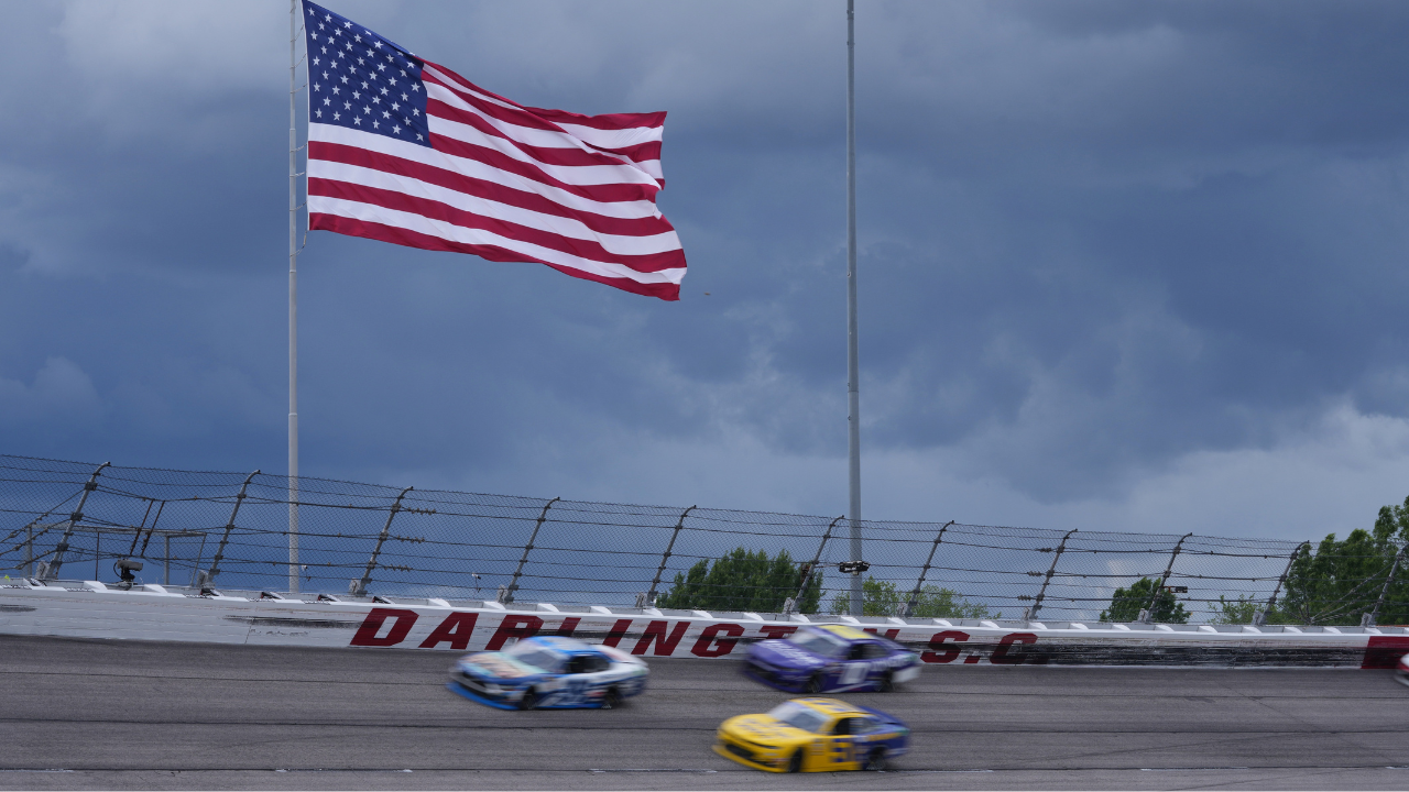 May 7, 2022; Darlington, South Carolina, USA; NASCAR Xfinity Series driver Ryan Sieg (38), races Jeremy Clements (51) and Landon Cassill (10) during the Mahindra ROXOR 200 at Darlington Raceway. Mandatory Credit: Jasen Vinlove-USA TODAY Sports