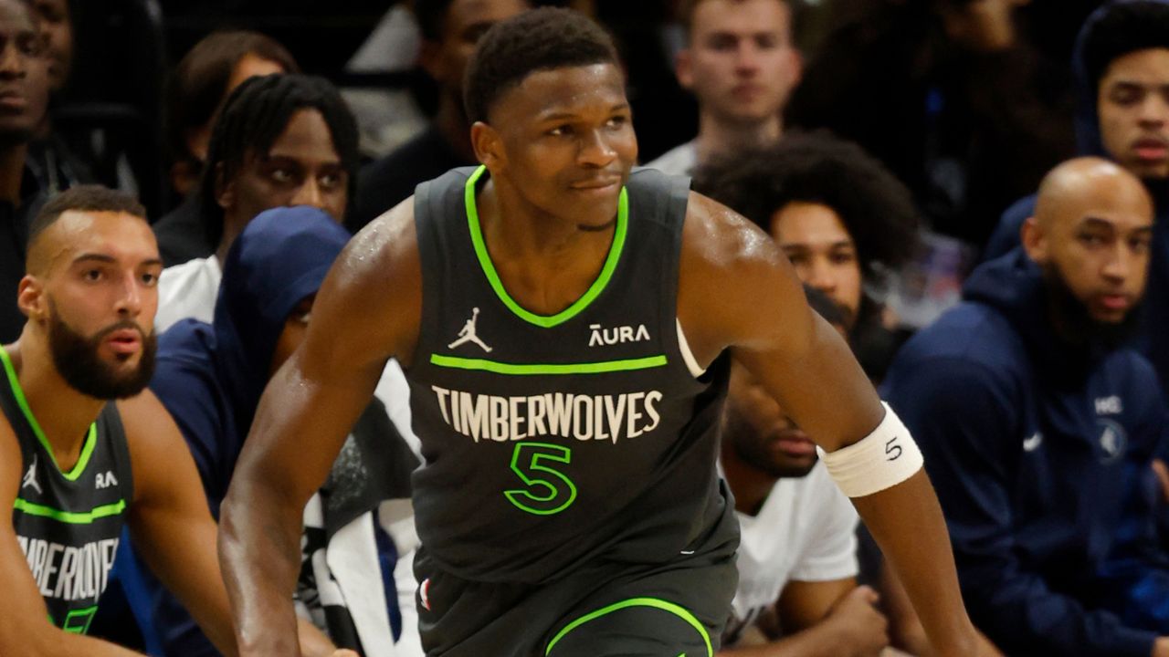 Anthony Edwards Shows Off His $15000 Gold And Diamond Plated Earbuds