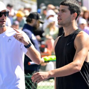 Juan Carlos Ferrero (L) and Carlos Alcaraz (R)