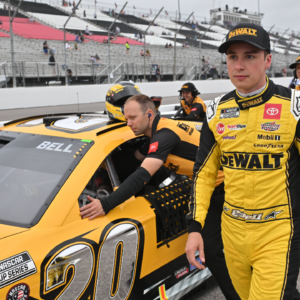 MADISON, IL - JUNE 01: Christopher Bell ( 20 Joe Gibbs Racing DEWALT Toyota) is shown with his car before qualifying for the NASCAR, Motorsport, USA Cup Series Enjoy Illinois 300 presented by Ticketsmarter on June 01, 2024, at World Wide Technology Raceway at Gateway, Madison, IL. (Photo by Keith Gillett/Icon Sportswire)