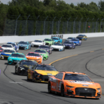 Jul 23, 2023; Long Pond, Pennsylvania, USA; NASCAR Cup Series driver Kevin Harvick (4) leads a pack of cars during the HighPoint.com 400 at Pocono Raceway. Mandatory Credit: Matthew O'Haren-USA TODAY Sports