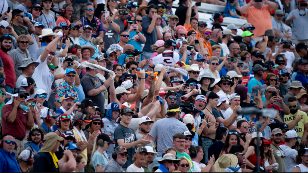 Race fans cheer the start of the NASCAR Xfinity Series Tennessee Lottery 250 at Nashville Superspeedway in Lebanon, Tenn., Saturday, June 29, 2024.