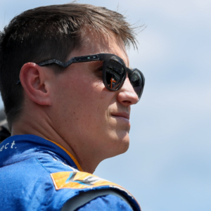 Jul 13, 2024; Long Pond, Pennsylvania, USA; NASCAR Cup Series driver Zane Smith looks on from pit road during practice and qualifying for the The Great American Getaway 400 at Pocono Raceway. Mandatory Credit: Matthew O'Haren-USA TODAY Sports