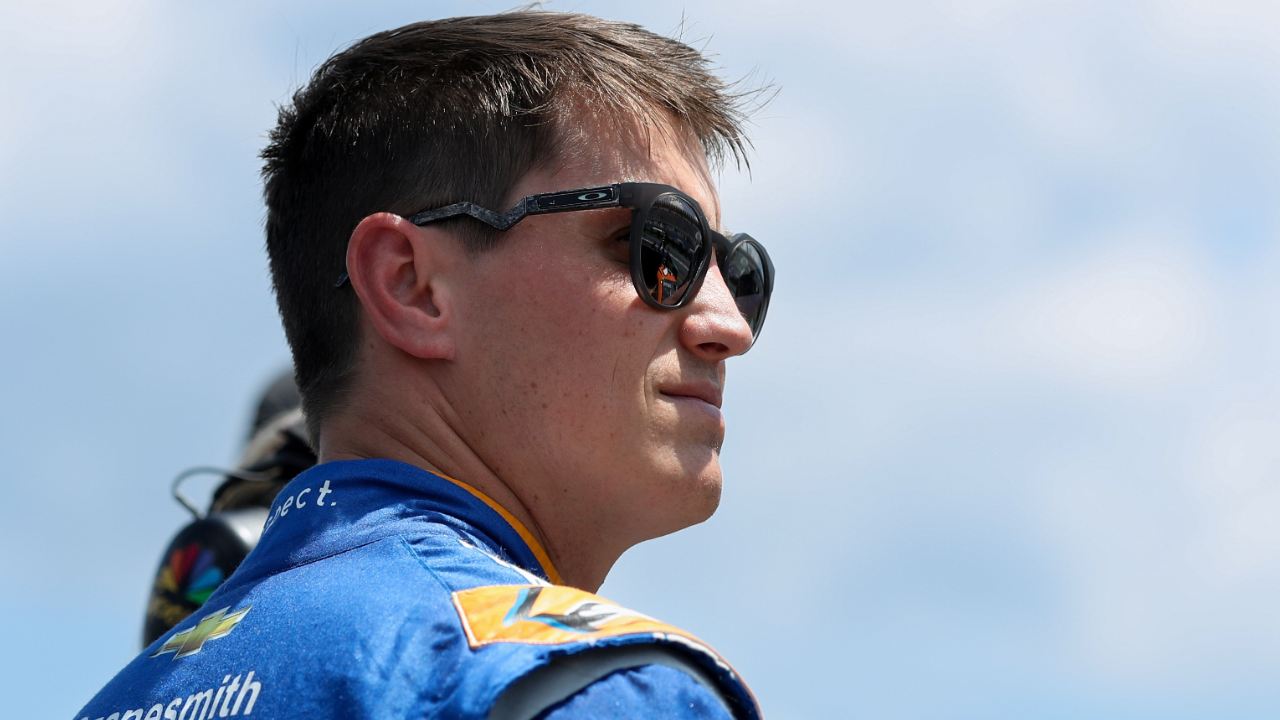 Jul 13, 2024; Long Pond, Pennsylvania, USA; NASCAR Cup Series driver Zane Smith looks on from pit road during practice and qualifying for the The Great American Getaway 400 at Pocono Raceway. Mandatory Credit: Matthew O'Haren-USA TODAY Sports
